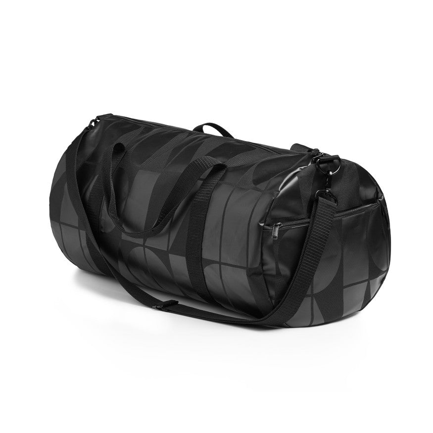 Black duffel bag with geometric pattern on a white background