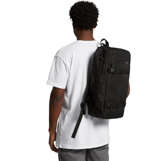 Person wearing a black backpack on a white background