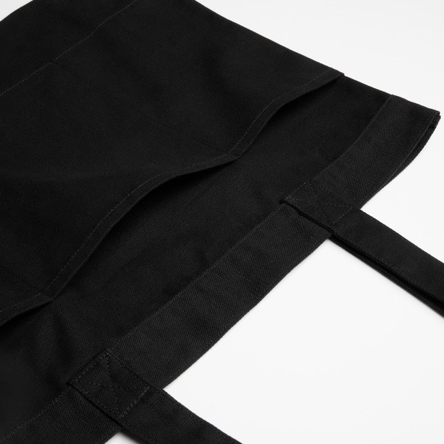 Close-up of a premium black bib apron on a white background, ideal for custom embroidery or Supacolor branding for Christchurch hospitality staff.