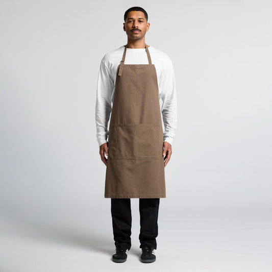 Professional male model wearing a blank chocolate brown bib apron, a stylish uniform choice for Christchurch cafes and barbershops offering custom embroidery or Supacolor branding.