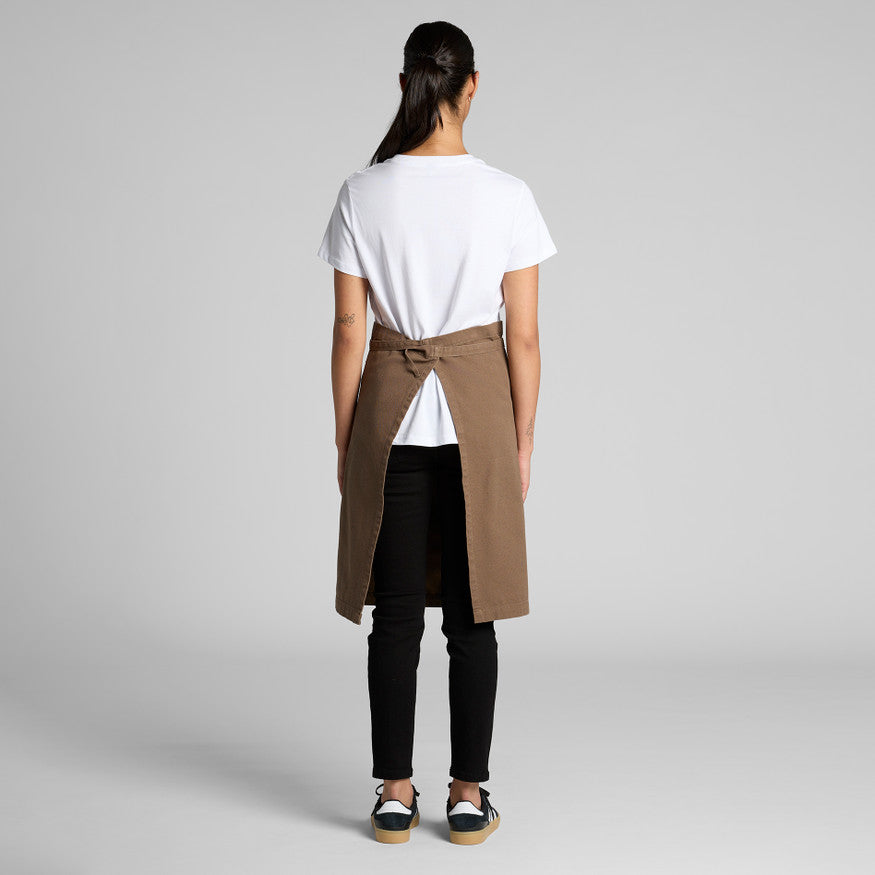 Full-body view of a female wearing a professional brown hospitality apron over a blank white shirt and black pants, an ideal uniform combination for Christchurch cafes and restaurants seeking custom branding.