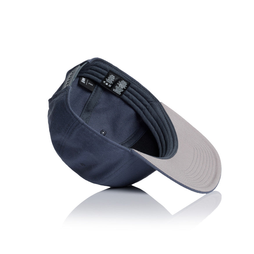 Navy and gray cap on a white background