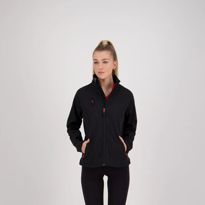 Woman wearing a black jacket with red accents on a white background