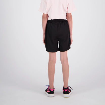 Person wearing black shorts on a white background