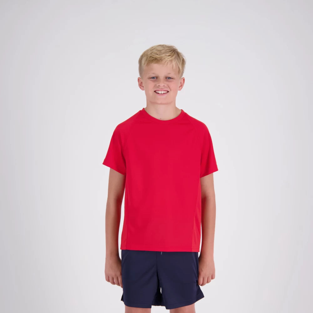 Child wearing a red t-shirt and navy shorts on a white background