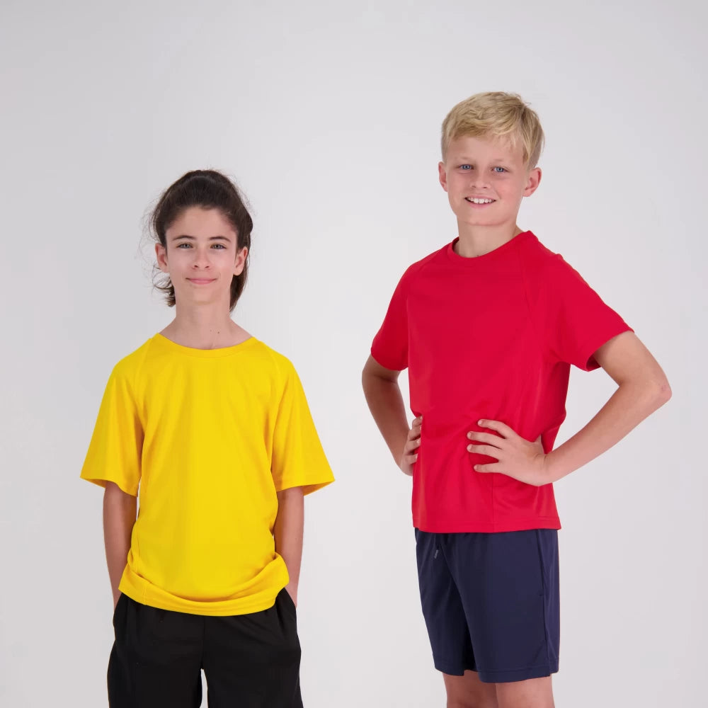 Two children wearing yellow and red shirts on a white background